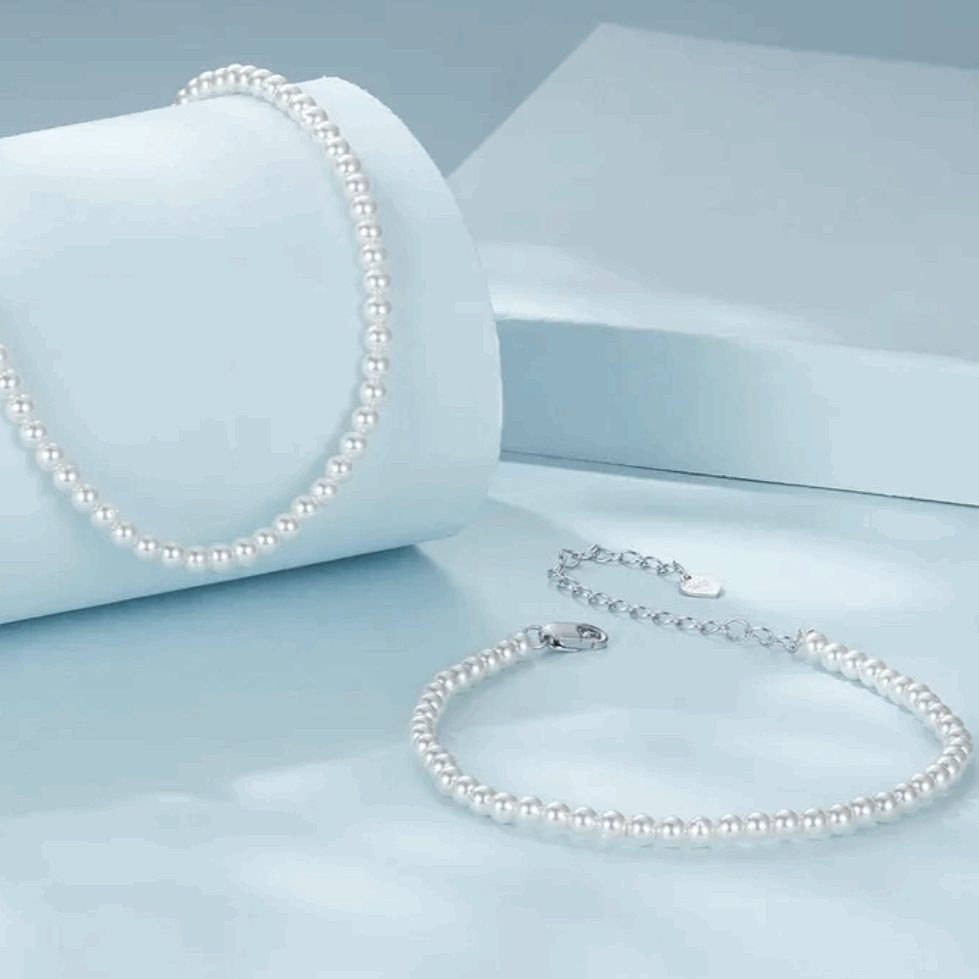 Pearl necklace on a light blue background