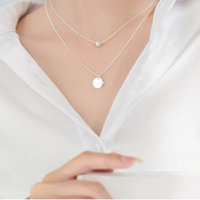 Customer wearing Double Layer Silver Coin Necklace