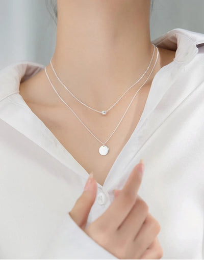 Customer wearing Double Layer Silver Coin Necklace