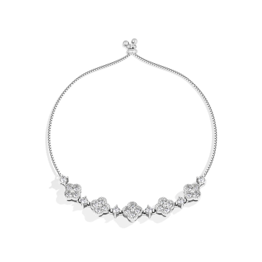 Silver necklace with heart-shaped gemstones on a white background, branded 'MirrorQuenn'.