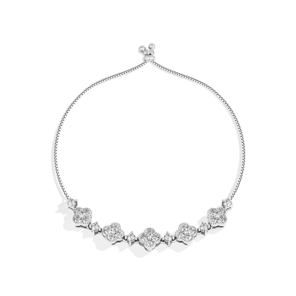 Silver necklace with clear stones on a white background, branded 'MirrorQuenn'.