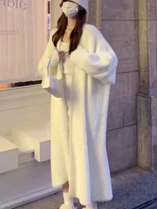 Side profile of the thick, warm knit sweater coat